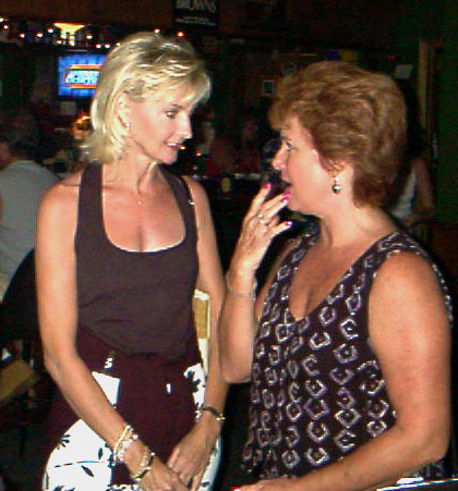 Pam tells Lynn Jerger about the magic coin!